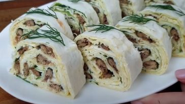 Закуска зі шпрот у лаваші на святковий стіл: вік живи- століття вчися